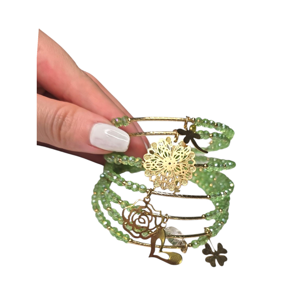 Rubylishious 
Handmade green Glass bead bracelet with memory Wire 
One size
Has